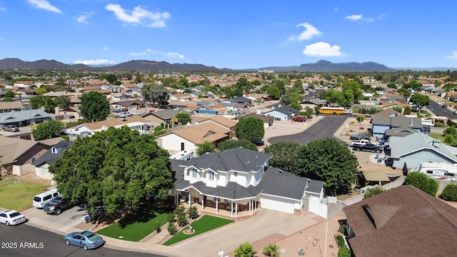 bird's eye view featuring a residential view and a mountain view