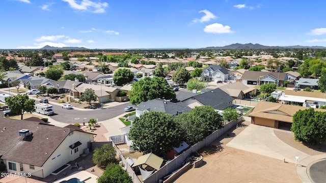drone / aerial view with a residential view and a mountain view