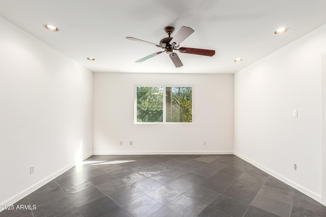 unfurnished room with recessed lighting, a ceiling fan, and baseboards