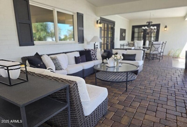 view of patio / terrace featuring an outdoor living space and outdoor dining space