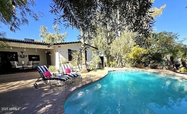 pool featuring a patio