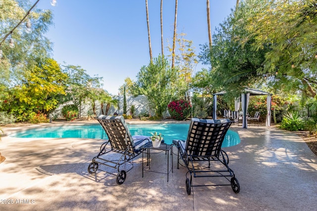 view of pool featuring a gazebo, a patio, a fenced backyard, and a fenced in pool