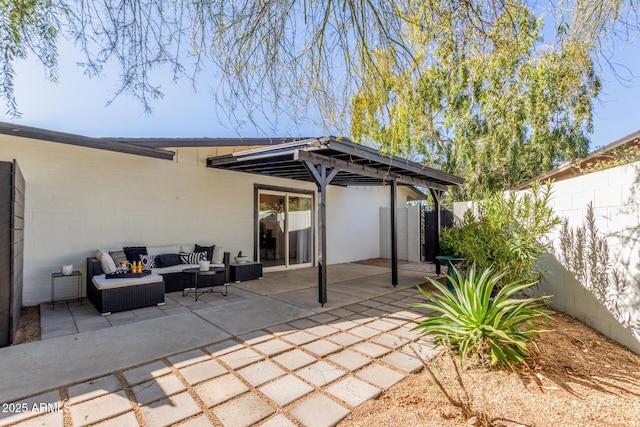 view of patio featuring a fenced backyard and an outdoor living space