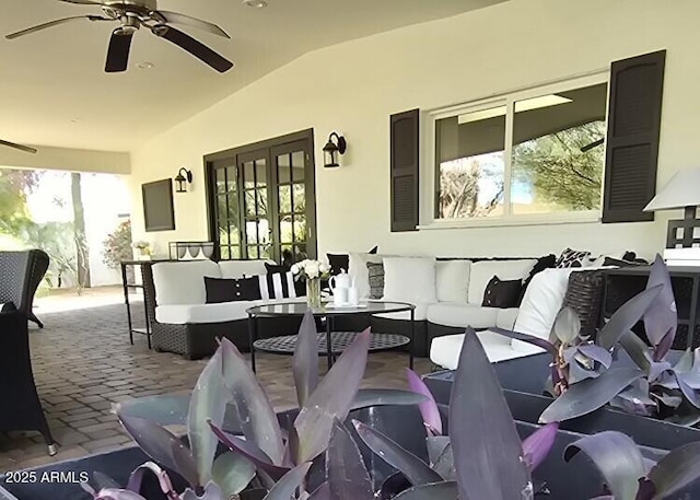 view of patio with outdoor lounge area and ceiling fan