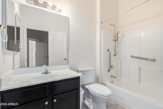 full bathroom featuring tile patterned flooring, vanity, toilet, and shower / tub combination