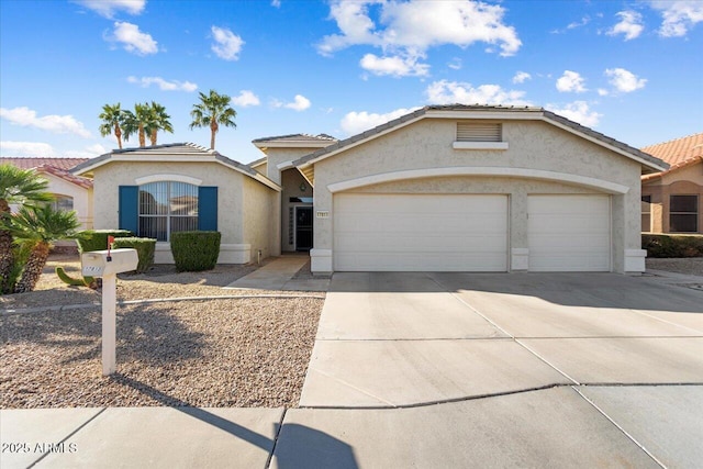 ranch-style house with a garage