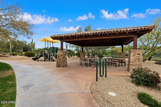 view of home's community featuring a gazebo and a playground