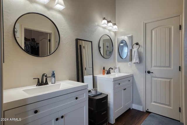 bathroom featuring hardwood / wood-style floors and vanity