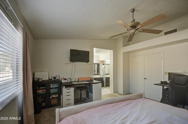 13842 S 40th St Unit 1004, Phoenix, AZ 85044 - bedroom with multiple windows, vaulted ceiling, a closet, and ceiling fan
