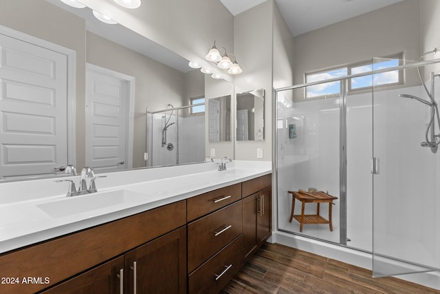 4240 Blacksmith Way, Wickenburg, AZ 85390 - full bathroom featuring a shower stall, double vanity, and wood finished floors