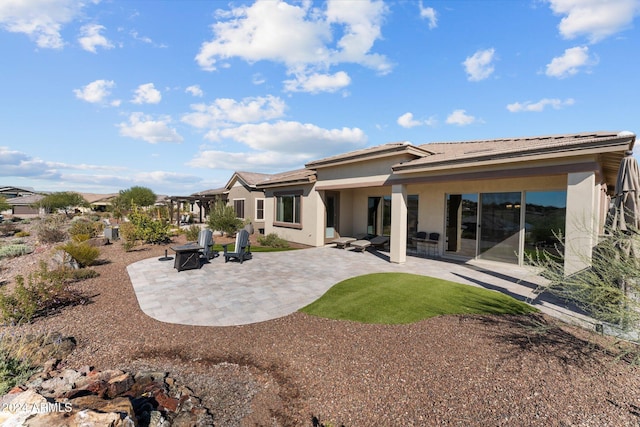 4240 Blacksmith Way, Wickenburg, AZ 85390 - back of property featuring a patio area and stucco siding