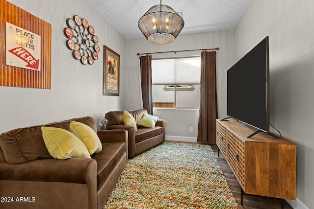 4240 Blacksmith Way, Wickenburg, AZ 85390 - living room featuring a chandelier, baseboards, and wood finished floors