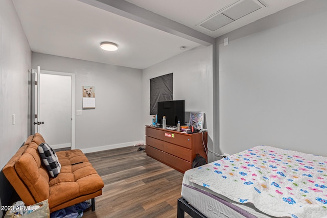 bedroom featuring dark hardwood / wood-style floors