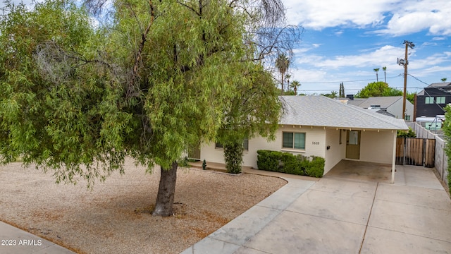 view of front of house featuring a carport