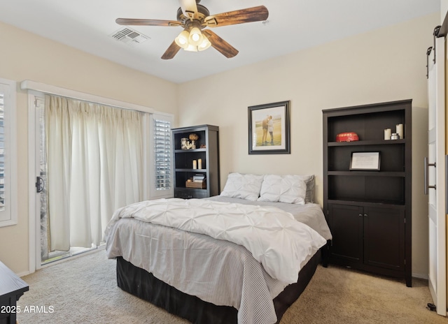 4772 E Portola Valley Dr Unit 102, Gilbert, AZ 85297 - bedroom featuring light colored carpet and ceiling fan