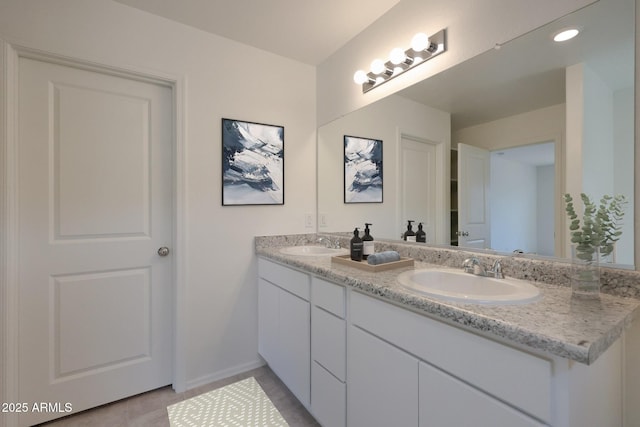 1431 W Tigua Way, Coolidge, AZ 85128 - bathroom with double vanity and tile patterned flooring