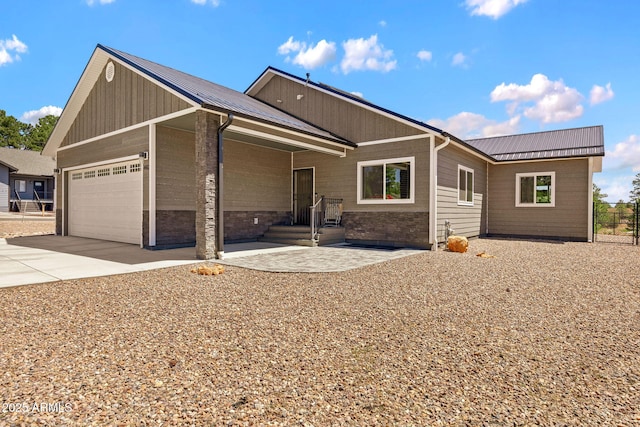 460 S Mountaine Pines Ave, Show Low, AZ 85901 - view of front of property featuring a garage, a metal roof, and concrete driveway