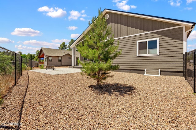 460 S Mountaine Pines Ave, Show Low, AZ 85901 - rear view of property featuring a fenced backyard and a patio area