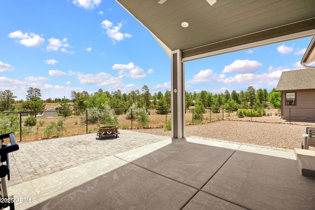 460 S Mountaine Pines Ave, Show Low, AZ 85901 - fenced backyard with an outdoor fire pit, a patio, and a ceiling fan