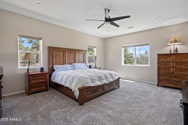 460 S Mountaine Pines Ave, Show Low, AZ 85901 - carpeted bedroom with multiple windows and ceiling fan