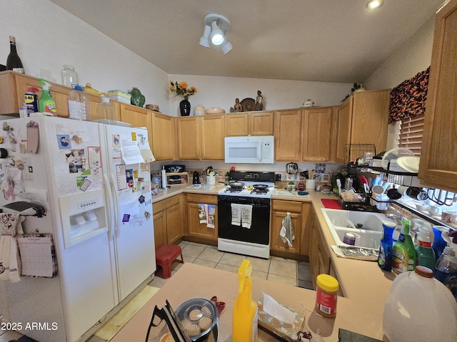 804 W Hess Ave, Coolidge, AZ 85128 - kitchen with white appliances, light countertops, light tile patterned floors, and vaulted ceiling