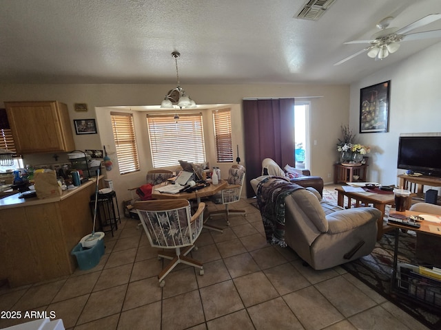 804 W Hess Ave, Coolidge, AZ 85128 - living room featuring light tile patterned flooring and a ceiling fan
