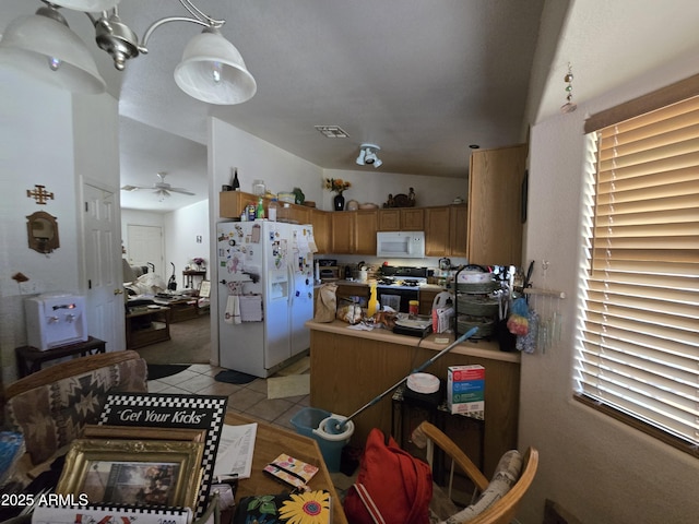 804 W Hess Ave, Coolidge, AZ 85128 - kitchen with white appliances, light tile patterned floors, a peninsula, light countertops, and brown cabinetry