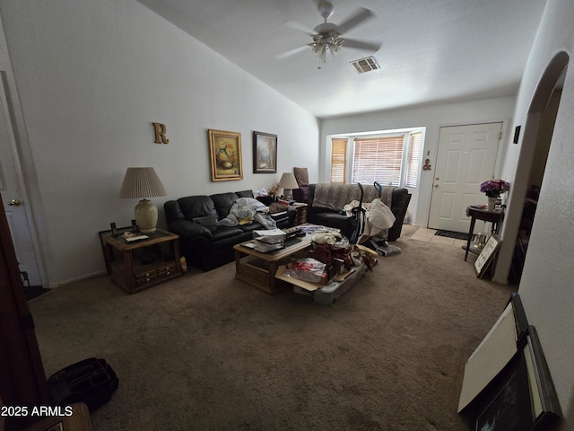 804 W Hess Ave, Coolidge, AZ 85128 - carpeted living area featuring a ceiling fan, vaulted ceiling, and arched walkways