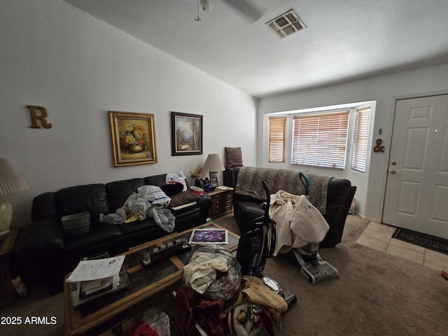 804 W Hess Ave, Coolidge, AZ 85128 - carpeted living area featuring vaulted ceiling and tile patterned flooring