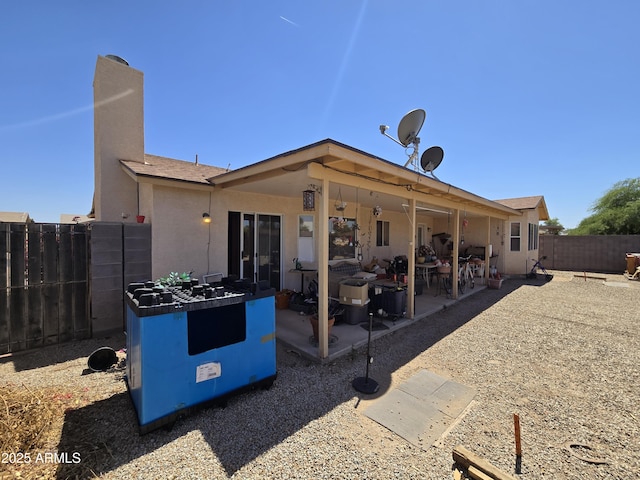804 W Hess Ave, Coolidge, AZ 85128 - back of house featuring a fenced backyard, a patio, and stucco siding