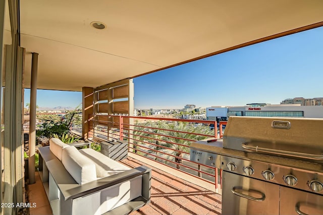 balcony with area for grilling and a view of city