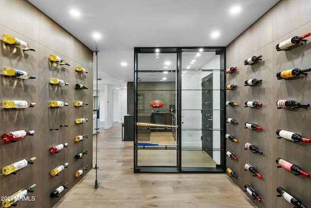 wine cellar featuring light wood finished floors