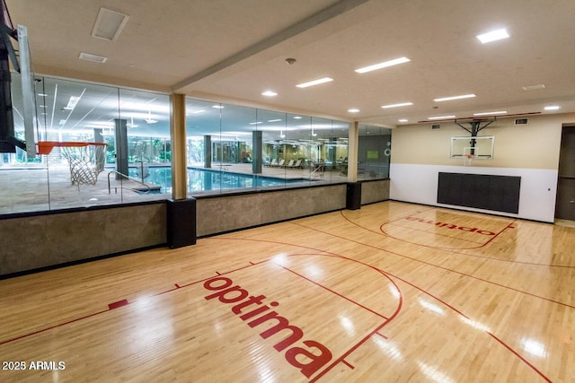 view of sport court with community basketball court