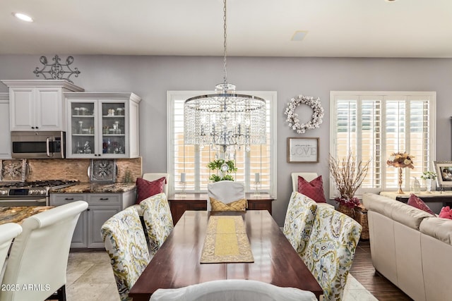 dining area with a chandelier