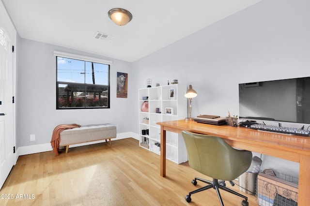 office area with hardwood / wood-style floors