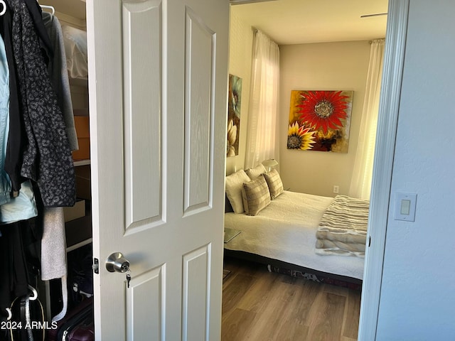 bedroom featuring wood-type flooring