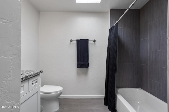 8425 E Hawthorne St, Tucson, AZ 85710 - bathroom with vanity, baseboards, toilet, shower / tub combo with curtain, and tile patterned floors