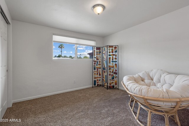 8425 E Hawthorne St, Tucson, AZ 85710 - living area featuring carpet floors and baseboards
