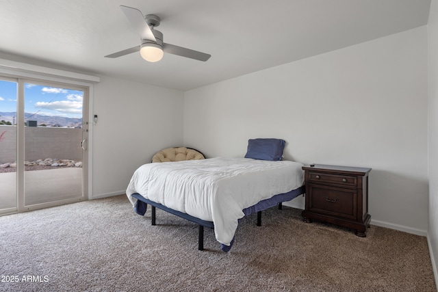 8425 E Hawthorne St, Tucson, AZ 85710 - bedroom with access to outside, carpet flooring, baseboards, and a ceiling fan