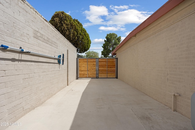 8425 E Hawthorne St, Tucson, AZ 85710 - view of home's exterior with fence and a patio area