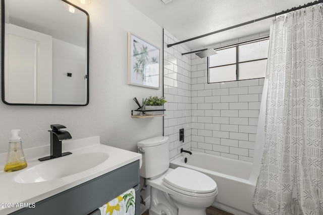 bathroom featuring toilet, vanity, and shower / tub combo with curtain