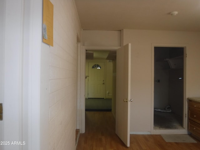 corridor featuring hardwood / wood-style flooring