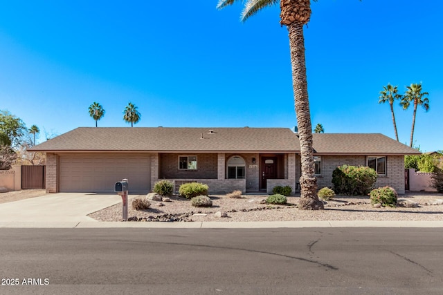 ranch-style house featuring a garage