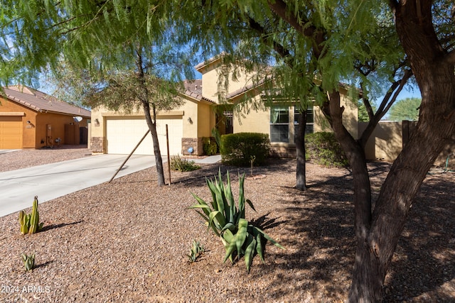 view of front of home featuring a garage