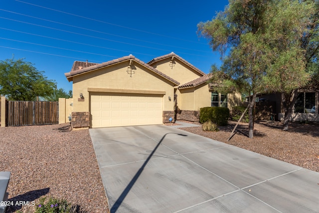 view of front of home with a garage