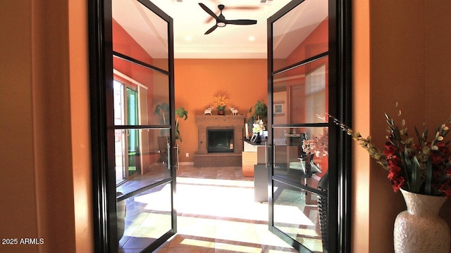 2285 E Mead Dr, Gilbert, AZ 85298 - entryway featuring a ceiling fan and a fireplace with raised hearth