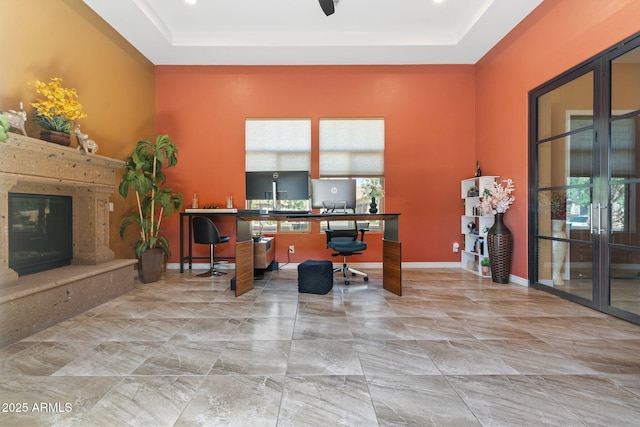 2285 E Mead Dr, Gilbert, AZ 85298 - office with a raised ceiling, a high end fireplace, baseboards, and light marble finish floors