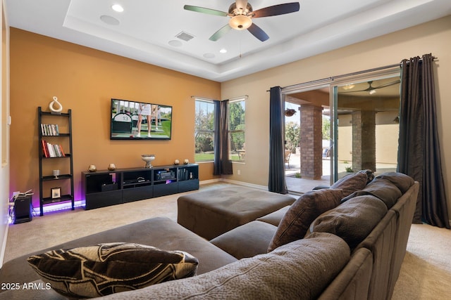 2285 E Mead Dr, Gilbert, AZ 85298 - carpeted living area featuring a ceiling fan, a tray ceiling, recessed lighting, and baseboards