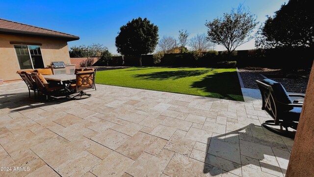 view of patio / terrace with a grill