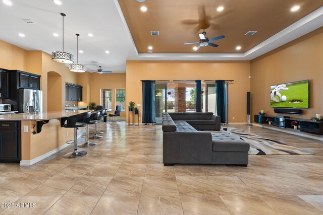 2285 E Mead Dr, Gilbert, AZ 85298 - rear view of property featuring stucco siding, a patio area, and an outdoor fire pit